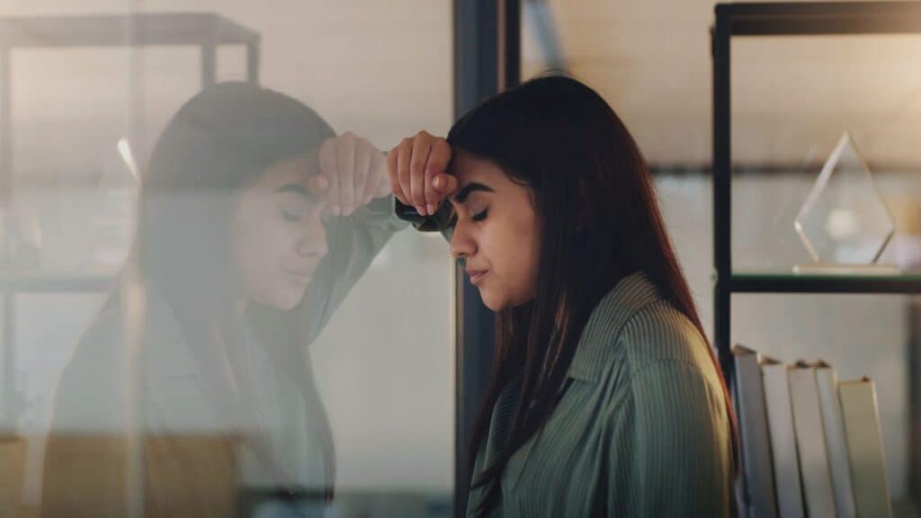 Woman experiencing signs of co-occurring disorders.
