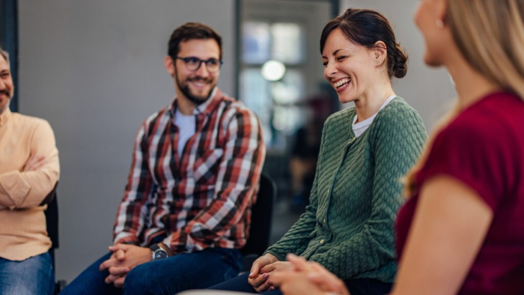 A group participates in a group treatment exercise after completing detox in Michigan 