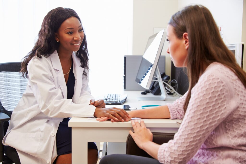 A woman consults her doctor about detox in Michigan 