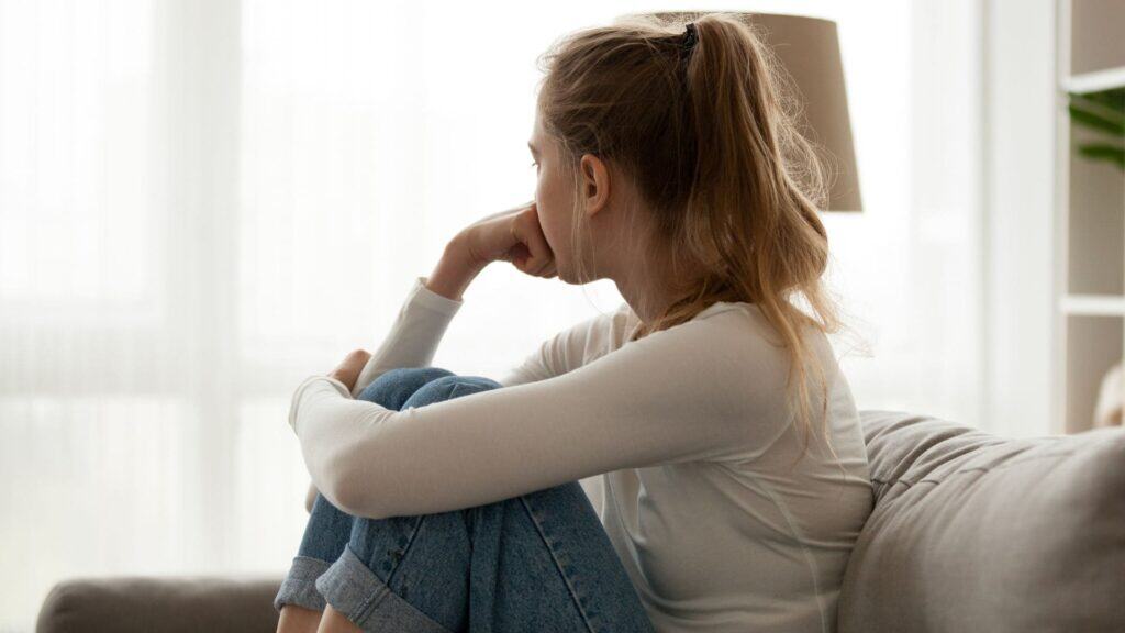 Woman experiencing signs of anxiety disorder.