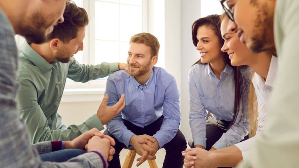 A man shares his experience during a group exercise at our drug rehab in Michigan.