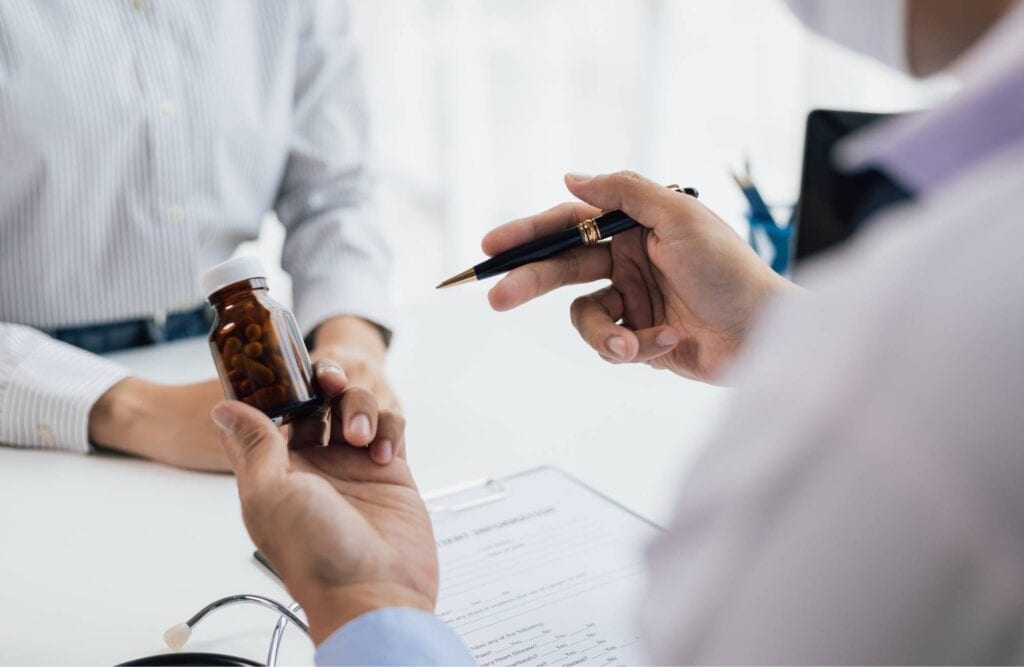 Doctor providing guidance to a client in opioid addiction treatment in Michigan.