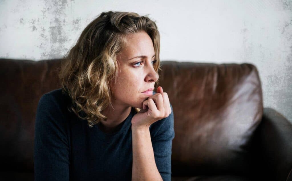 Woman struggling with PTSD symptoms.