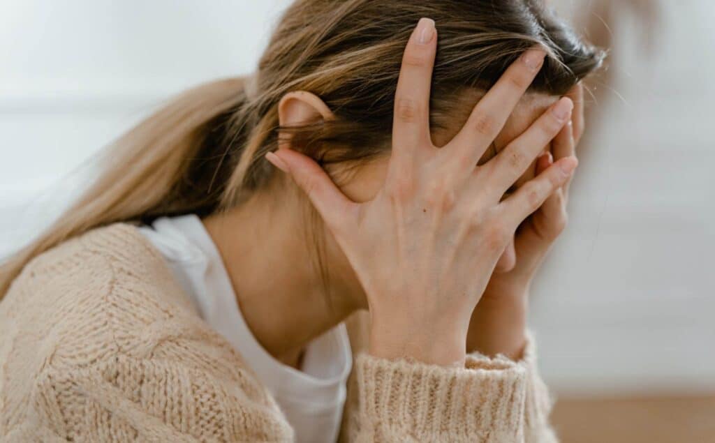 Woman experiencing challenges from stimulant addiction.