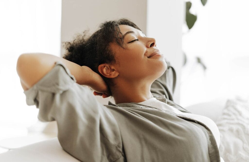 Woman feeling healthier after nutrition counseling in Michigan.