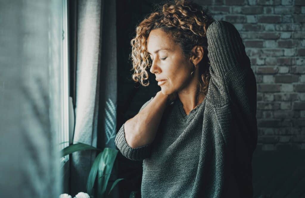 A woman, struggling with dependency, decides to seek hydrocodone addiction treatment in Michigan.