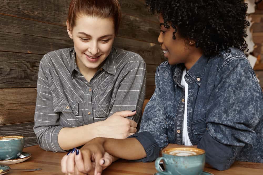 Couple sharing supportive conversation about how to get someone into alcohol rehab