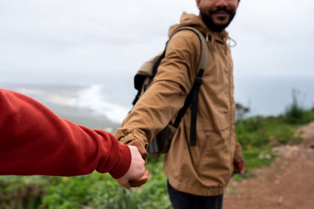 Couple hiking together while supporting recovery and rehab journey