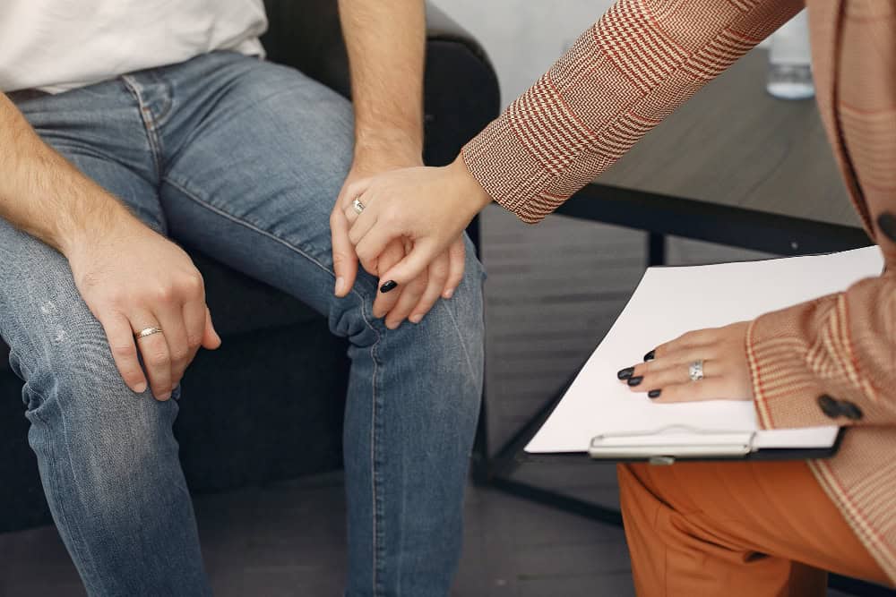 Man speaking with therapist during Northern Indiana addiction treatment session