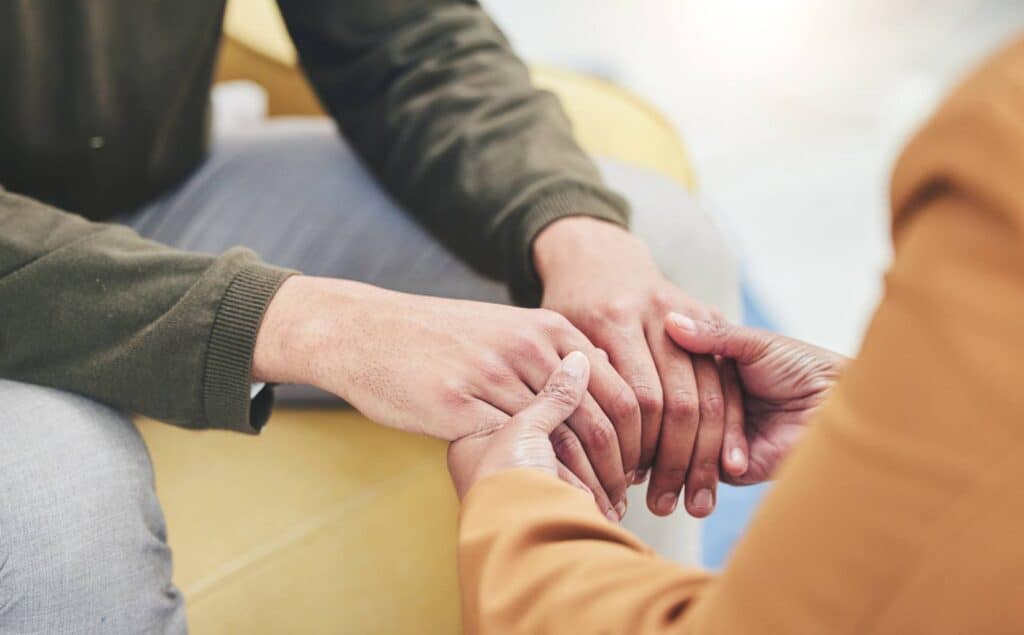 Client receiving support from therapist at a rehab serving South Bend, Indiana.