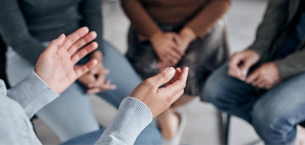 Patients participating in a group session in residential treatment near Northern Illinois.